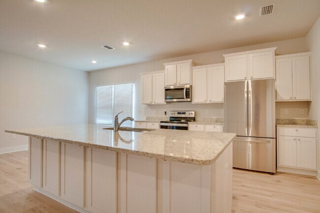 Building Photo - Deer Run 4-Bedroom Rental with 3-Car Garag...