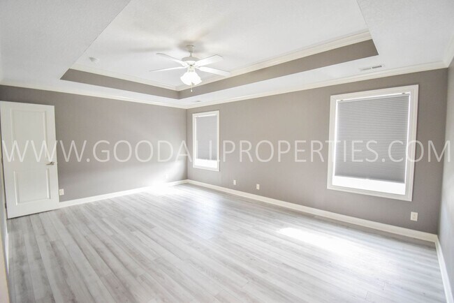 Building Photo - 4 Bedroom 4 Bath Executive Home in West Des Moines with a fenced in yard and a 3-car garage