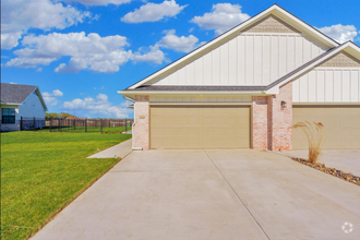 Building Photo - *Beautiful New Duplexes in Goddard School ...