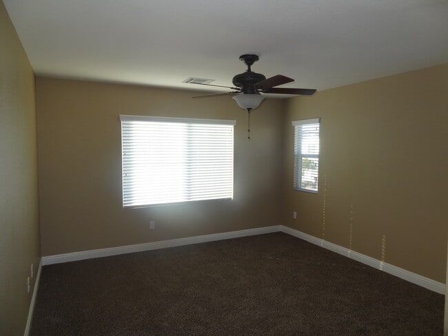 Building Photo - 3 Bedroom, 2 1/2 Bath Home With Attached Garage In A Gated Community
