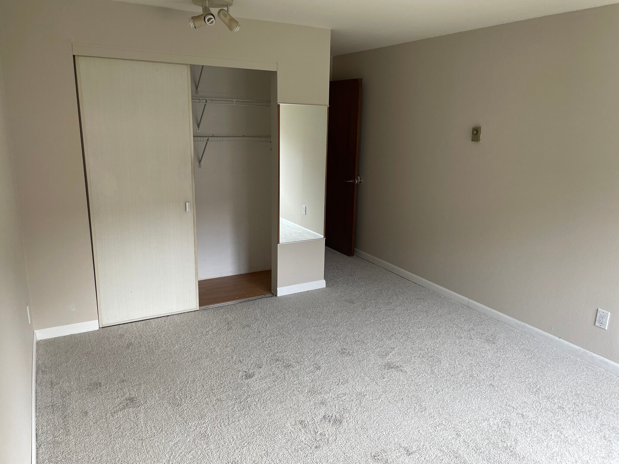 In bedroom with new carpet ('24). (facing southeast) - 7001 Sand Point Way NE