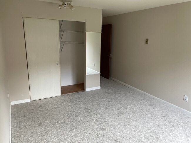 In bedroom with new carpet ('24). (facing southeast) - 7001 Sand Point Way NE