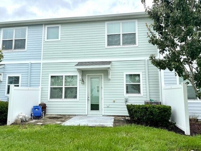 Building Photo - For Rent 3/2.5 townhome 2 Car Garage in Storey Lake,