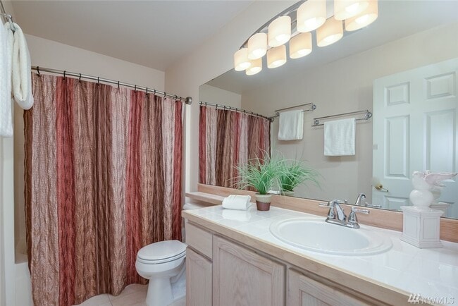 Building Photo - Elegant 3-Bedroom Home with Private Deck & Greenbelt Views!