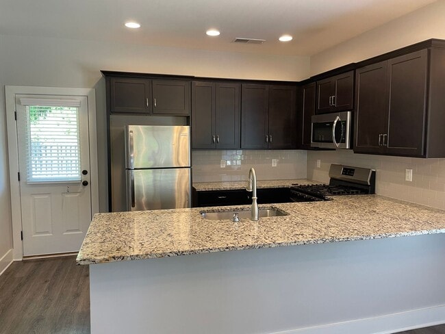 Building Photo - 3 Bedroom Home with Garage and Flat Fenced Backyard!