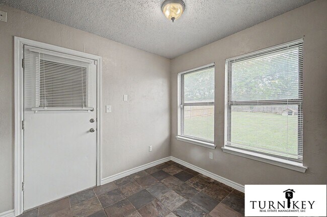 Building Photo - Cozy 3/2 Burleson Charmer | Wood-Burning Fireplace | 2-Car Garage | Pet-Friendly