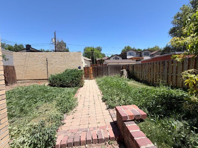 Building Photo - Classic Wash Park Gem with Detached Garage, Finished Basement & Stunning Great Room Addition