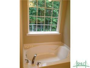 Building Photo - 5 bed 3 bath Home with a Fenced Yard and Hot Tub