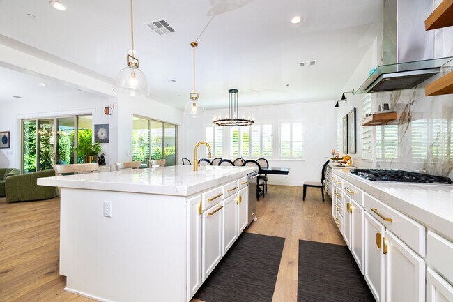 Building Photo - Gorgeous Custom Upgraded Serrano Home!