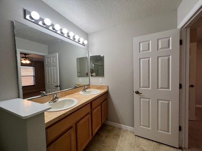 Building Photo - Bright 2BR 2.5BA Home w/ Community Pool/Playground Access • Full-Size Appliances • 1-Car Garage i...