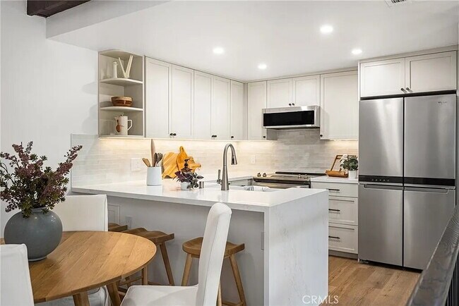 Building Photo - "Chic Marina Pacifica Retreat: 1-Bedroom G...