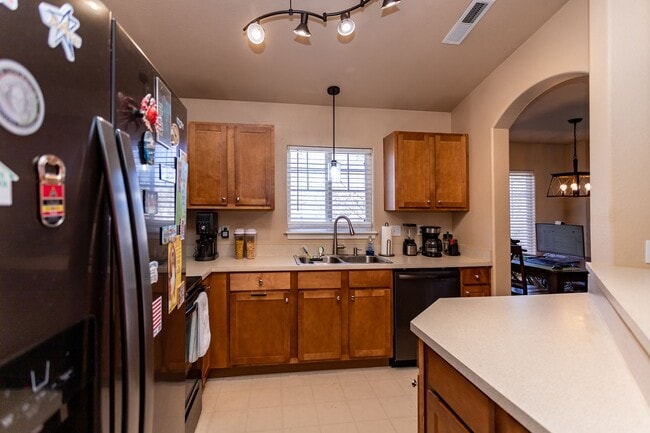 Building Photo - Beautiful upper-level condo in gated community!!!