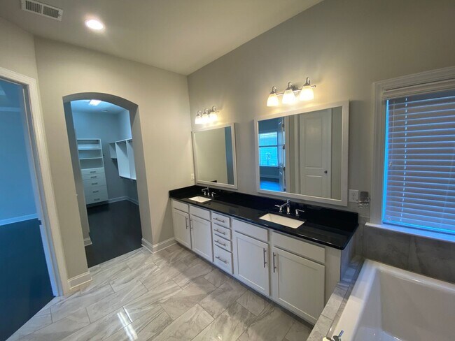 Building Photo - Stunning move in ready home located in the...