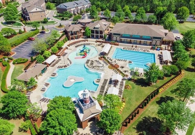 Building Photo - Charming Townhome with Open Layout, Back Patio & One-Car Garage – Near RTP, RDU & Everyday Conven...