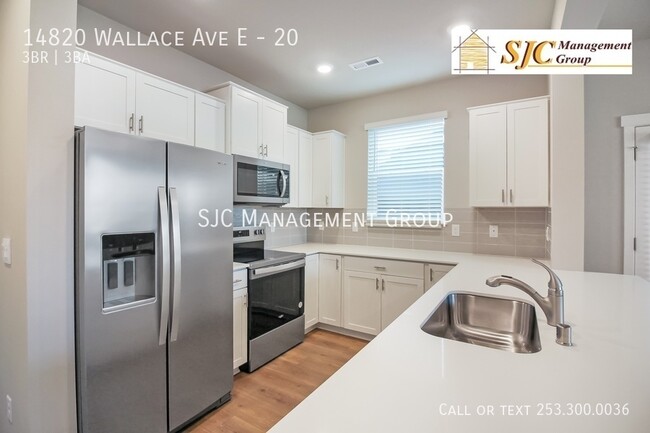 Building Photo - 14820 Wallace Ave E