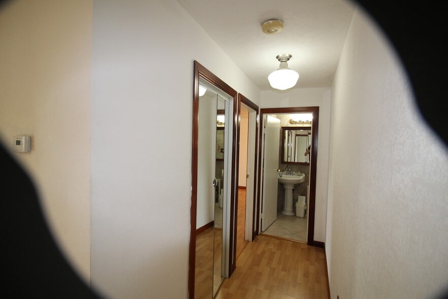 Upstairs Hallway towards Guest Bathroom - 458 Woodrail Dr