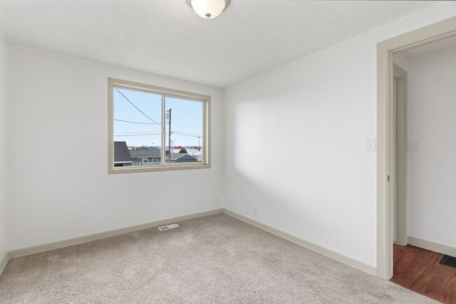 Building Photo - Charming 4 Bed, 2 Bath w/ Garage! *HOLIDAY SPECIAL: $1,000 OFF!*