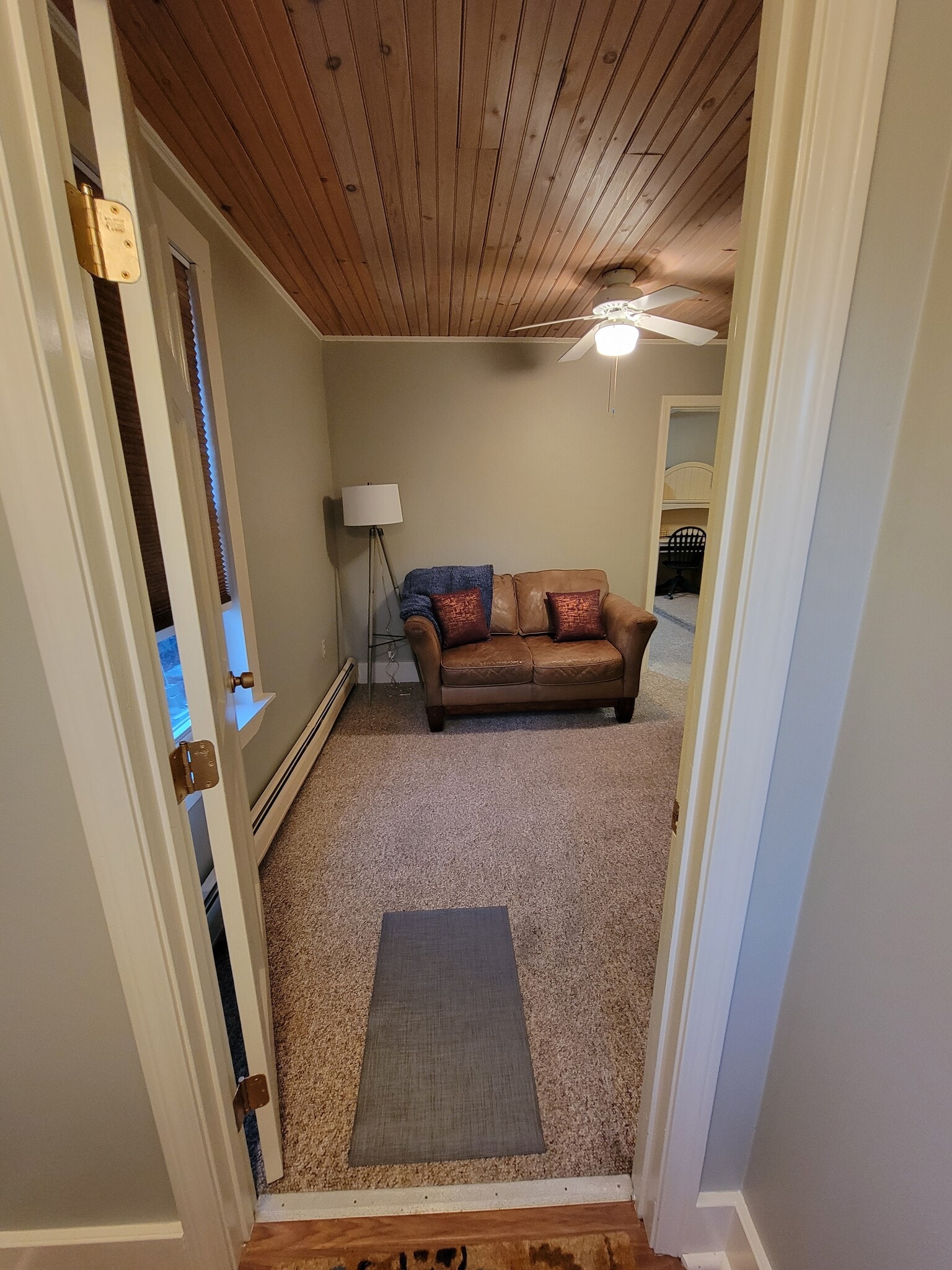 Entrance from breezeway to living room - 185 Main St