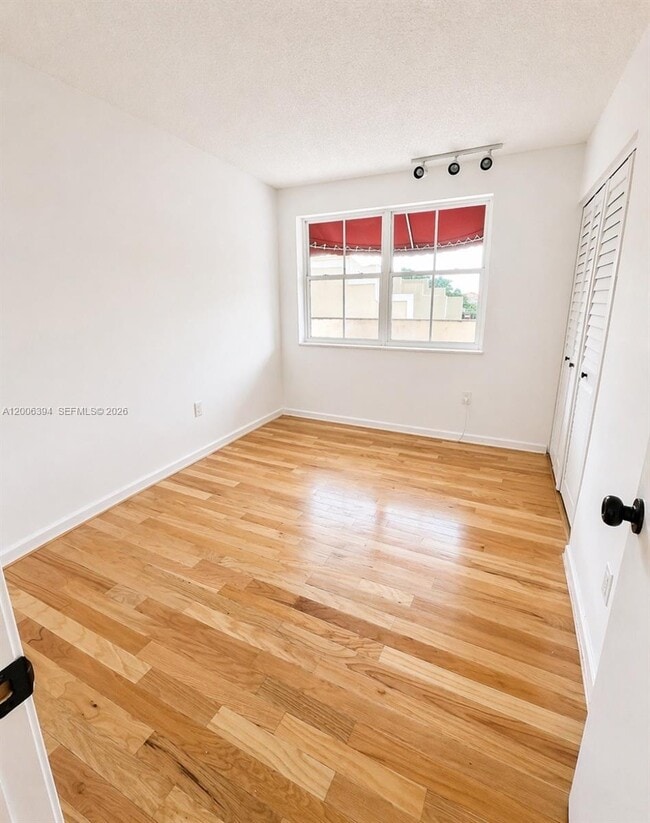 Building Photo - 8590 NW 3rd Ln