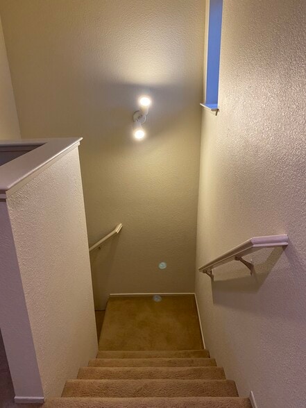 Stairs from top floor to entry level - 445 Willow Ave