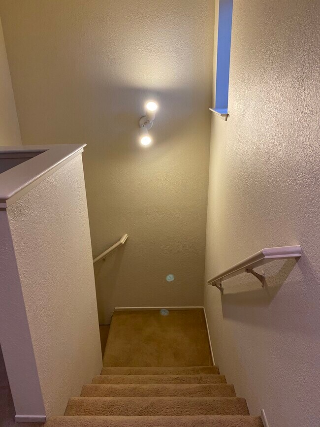 Stairs from top floor to entry level - 445 Willow Ave