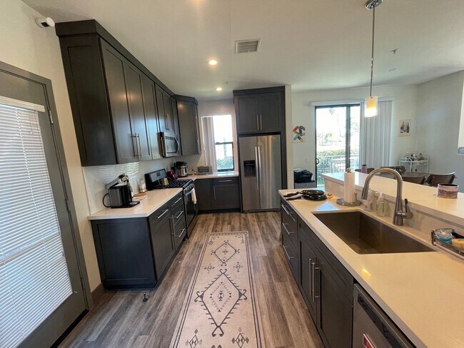 Building Photo - NEWER  4BED 3 BATH FRONT TOWNHOME*HWFLS*BALCONY*W/D IN  UNIT* CENTRAL AIR/HEAT* *STAINLESS  APPLI...