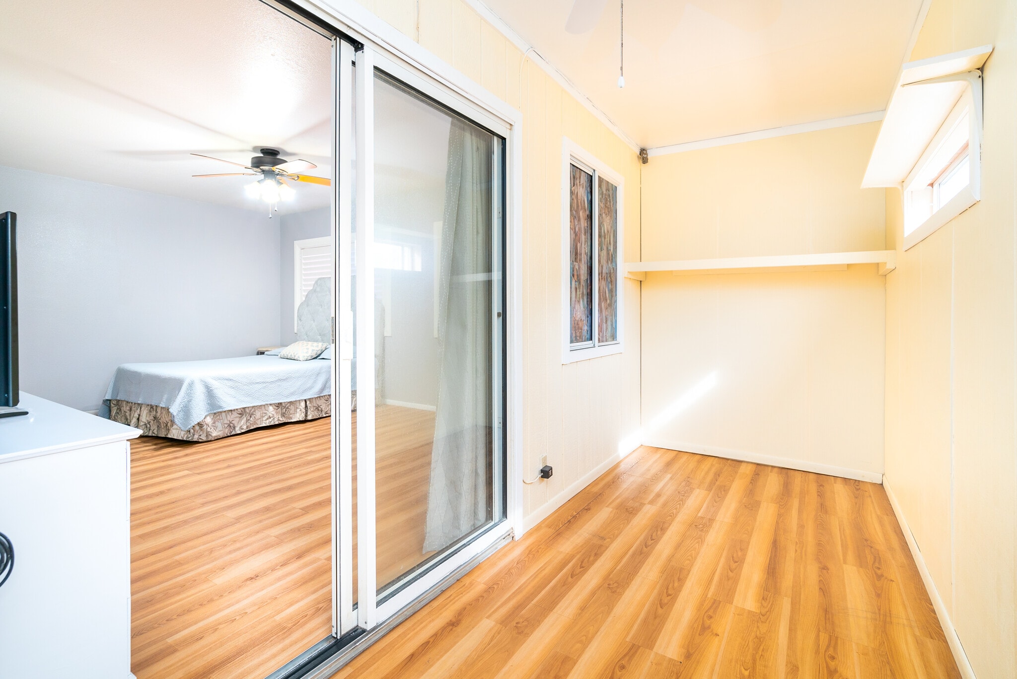 Second main bedroom closet view into bedroom. Room is much bigger than pictures suggest. - 408 N Kainalu Dr