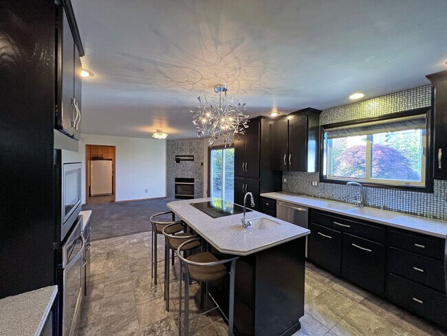 Building Photo - Stunning 4 Bedroom 2.5 Bath with Peek-a-Boo View of Puget Sound