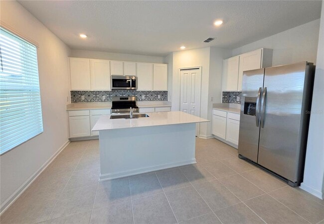 Building Photo - 5126 Magnolia Palm Dr