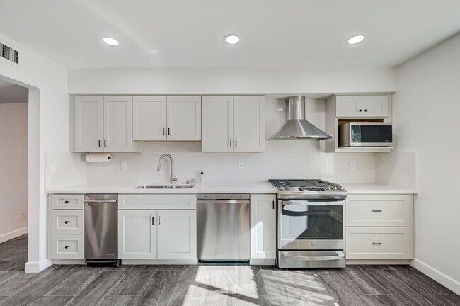 Building Photo - Welcome to this stunning 3-bedroom, 2-bath, single-story home that has been completely renovated ...