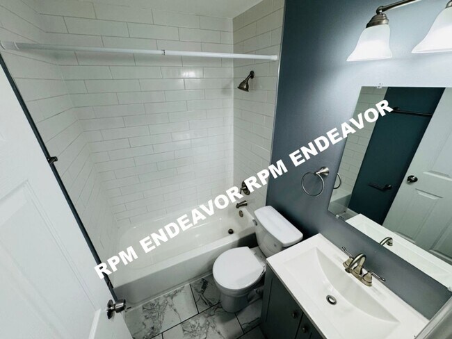 Building Photo - "Charming 4-Bedroom Haven with Sunroom, Ha...