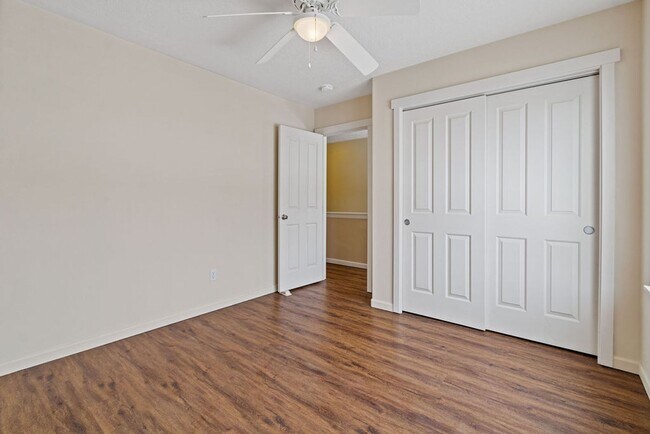 Building Photo - SPACIOUS LAYOUT! HARD SURFACE FLOORING, FENCED YARD & LARGE PATIO!