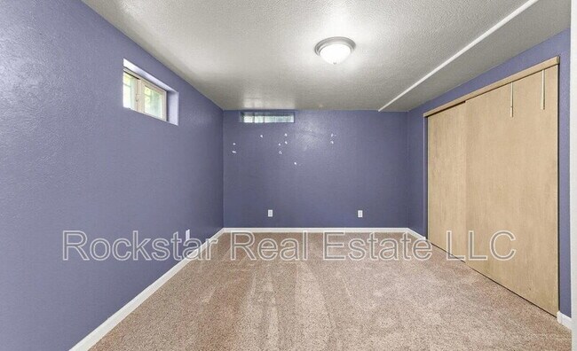 Building Photo - 1110 E 28th Ave