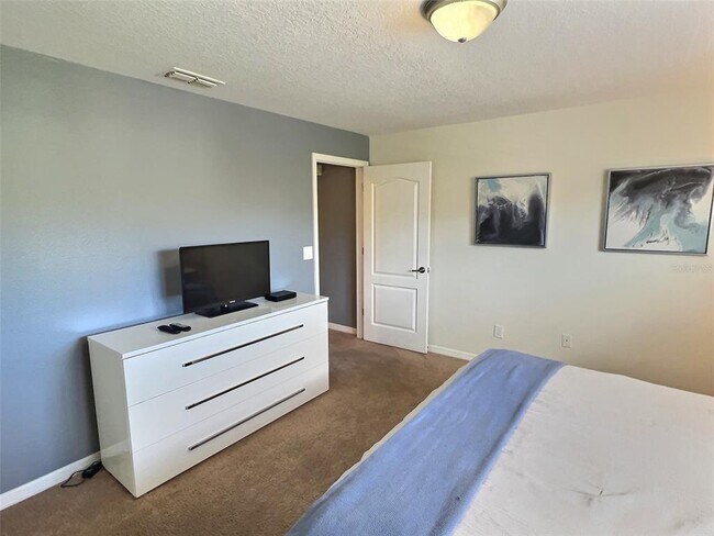 Building Photo - 8841 Candy Palm Rd