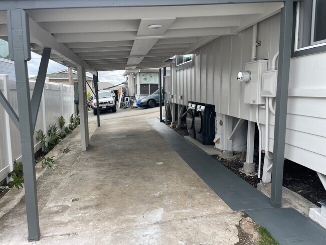 Carport area that can fit up to 3 cars - 1774F Palolo Ave
