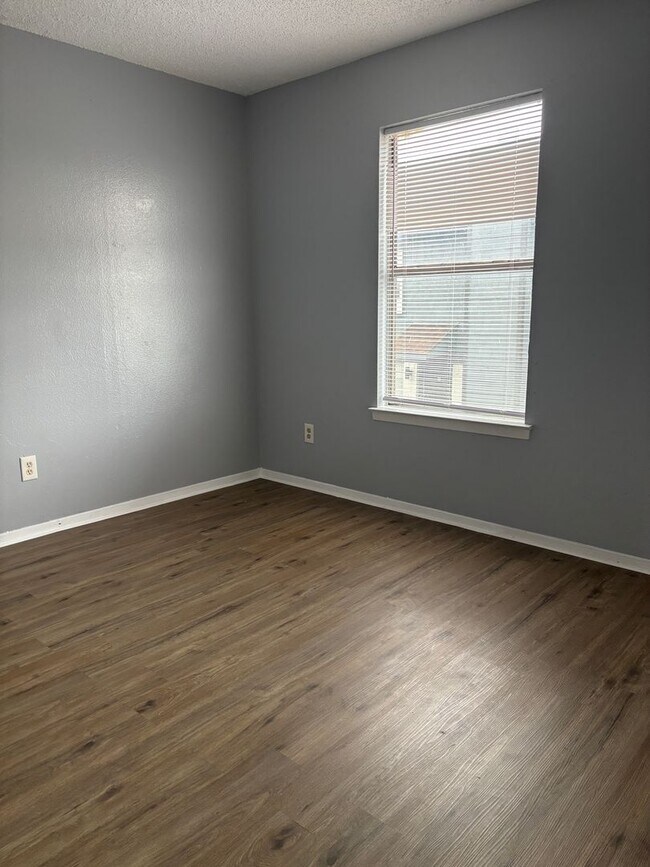 Building Photo - Affordable, Gated Community with Updated 2-Bedroom, 1.5-Bath