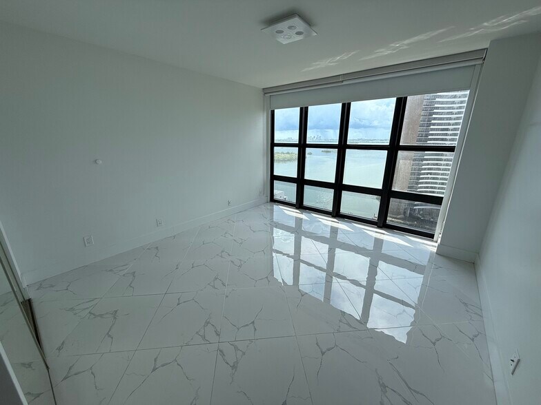 GUEST BD w floor to ceiling impact windows - 780 NE 69th St