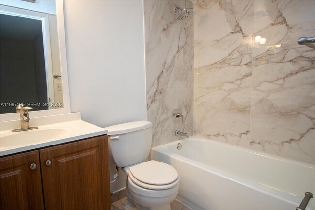 Building Photo - 9491 Palm Cir S