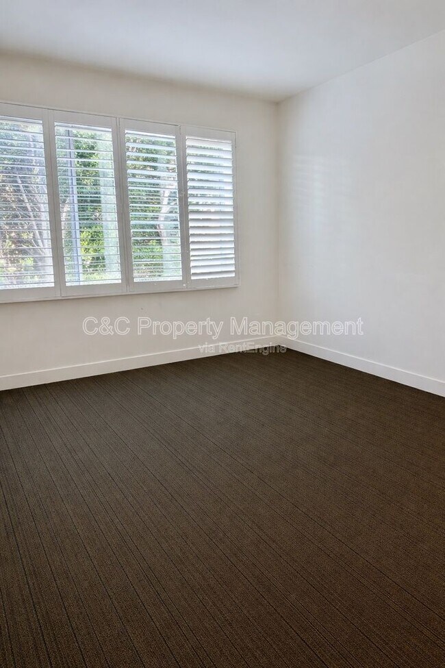 Building Photo - 7857 W Manchester Ave