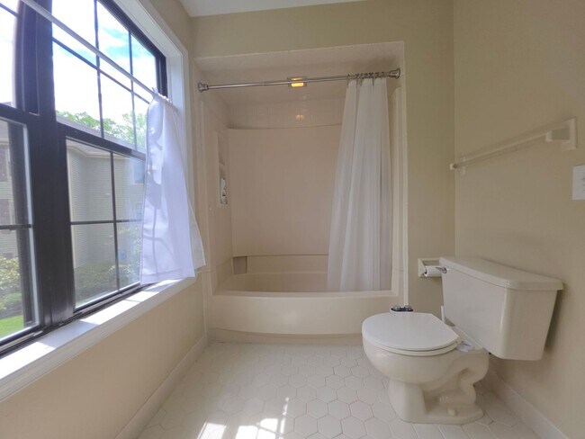 Building Photo - Rare opportunity! Furnished 2nd fl condominium boasting 2 large bedrooms, 2 full bathrooms, forma...