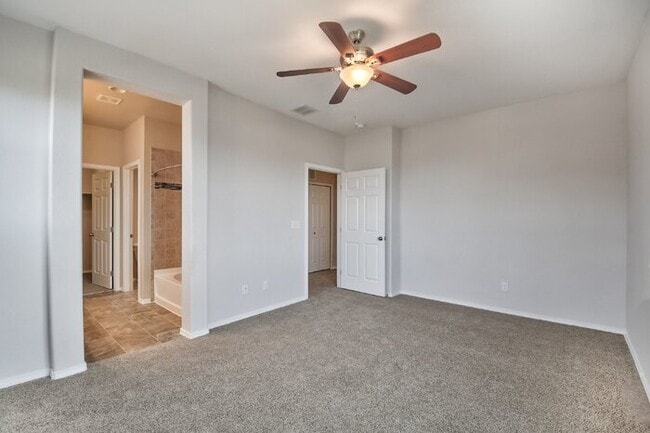 Building Photo - Immaculate 3-Bedroom Townhome with Stainless Steel Appliances and Attached Garage Near Peterson SFB