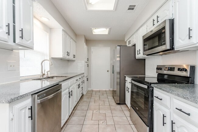 Building Photo - 4 Bedrooms | 2 Bathrooms | 2-Car Garage | Pool | Park-Front Living