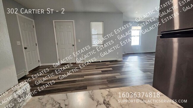 Building Photo - 302 Cartier St