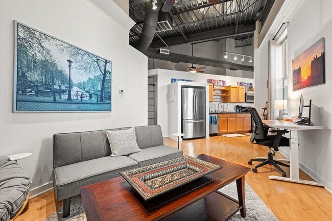 Building Photo - Furnished Top-Floor Condo with Rooftop Terrace Near UNC - Available NOW