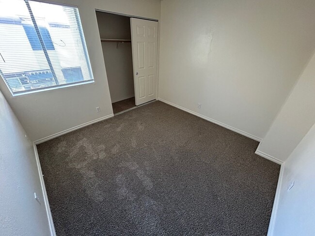 Building Photo - BRIGHT 2-BEDROOM CONDO NEAR LAS VEGAS LIVING