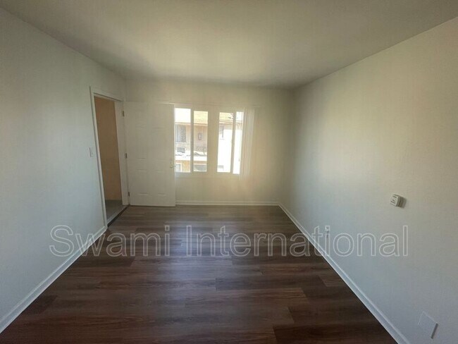 Building Photo - 9449 Normandie Ave