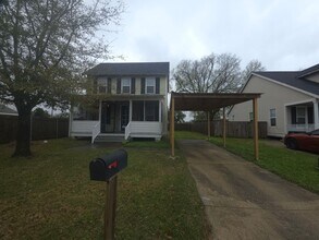 Building Photo - Two-story, 2 bedroom, 1 1/2 bath home