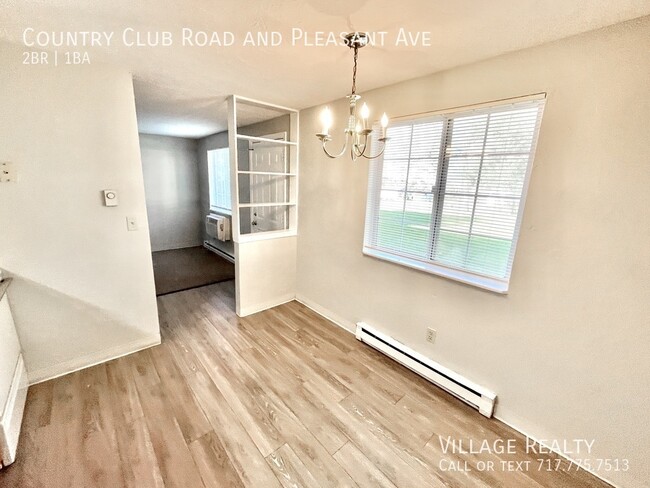 Building Photo - Roomy, remodeled 2-bed w/ on-site laundry ...