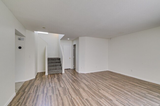 Building Photo - Spacious 4 Bedroom 2.5 Bathroom Home with Covered Patio & Large Backyard