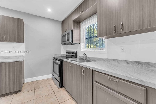 Building Photo - 6940 NW 6th Ct